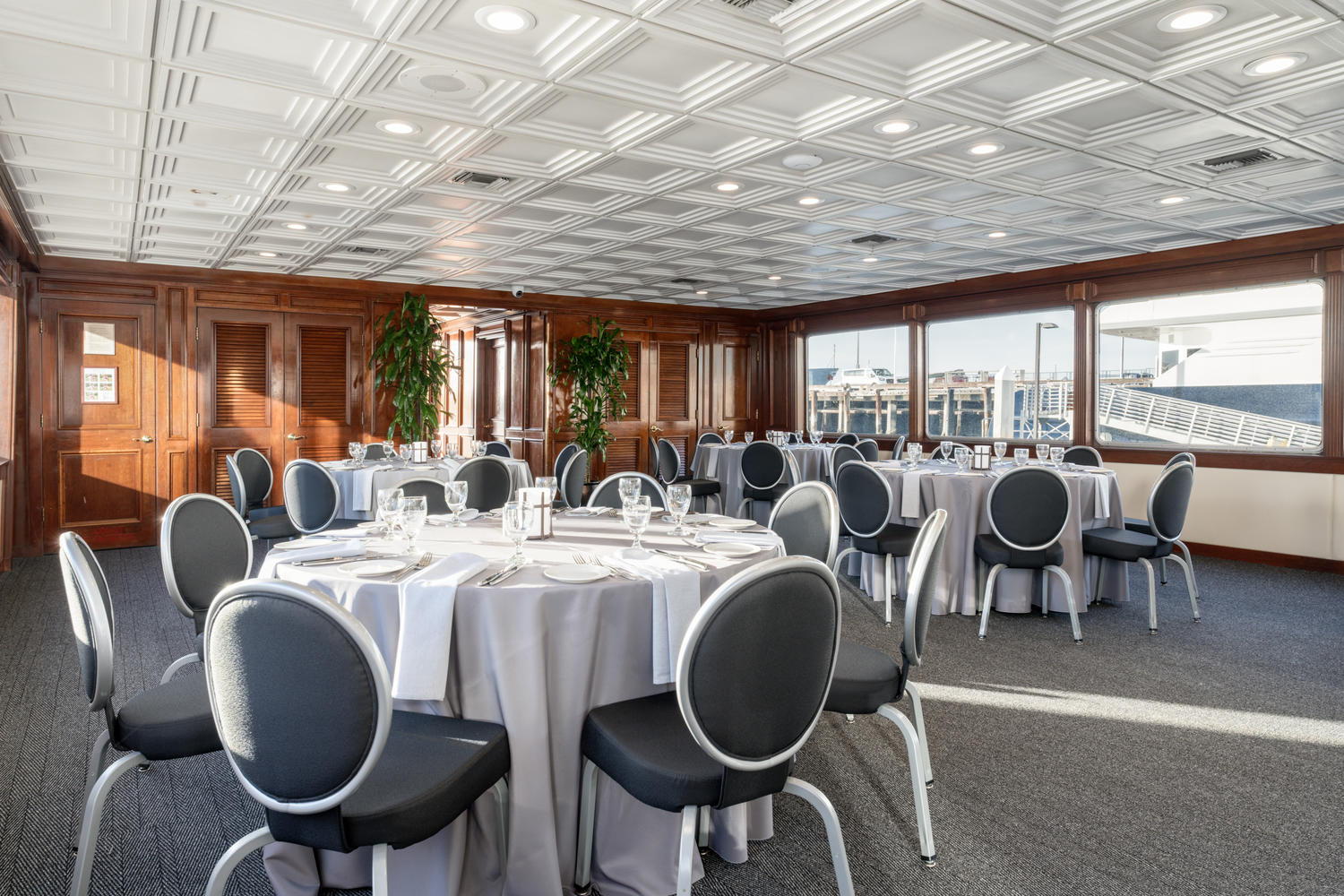 Main Deck – Aft View | Rich mahogany and cherry wood interior.