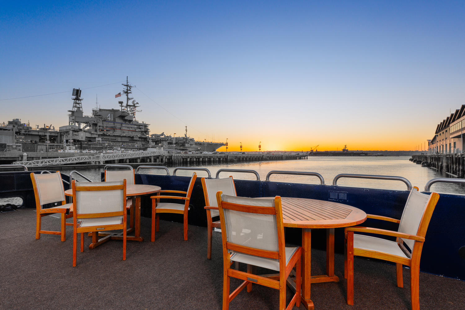 Main Deck – Aft Seating | Comfortable seating with bay and city views.