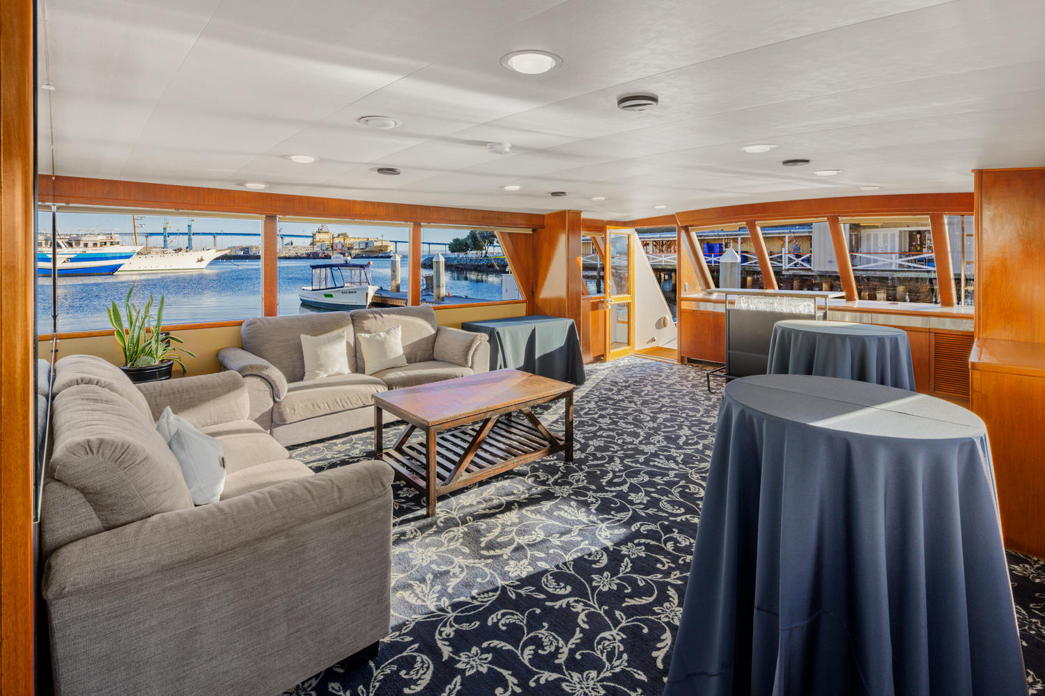 Main Deck Lounge – Aft View | Relax with stunning water views.