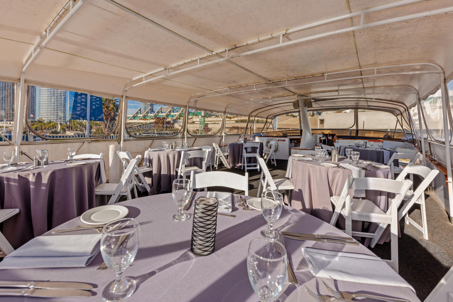 Top Deck – Forward View | Set for dining with open-air views.