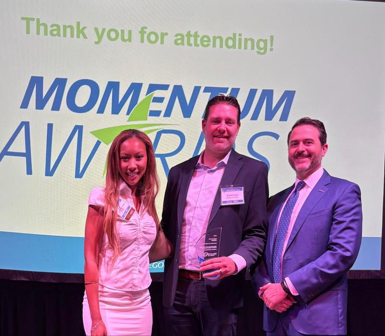 Three people smiling at the Circulate San Diego 2025 Momentum Awards 
