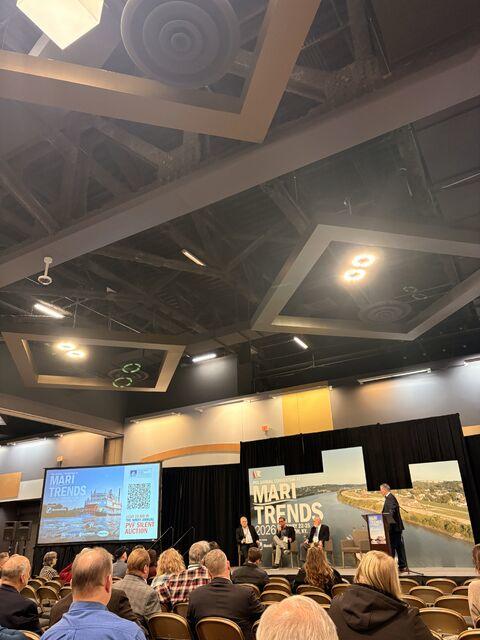 Conference panel on stage with audience seated, at the PVA Annual Convention 